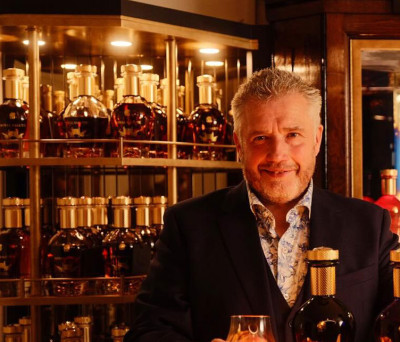 Sandy surrounded by whiskies